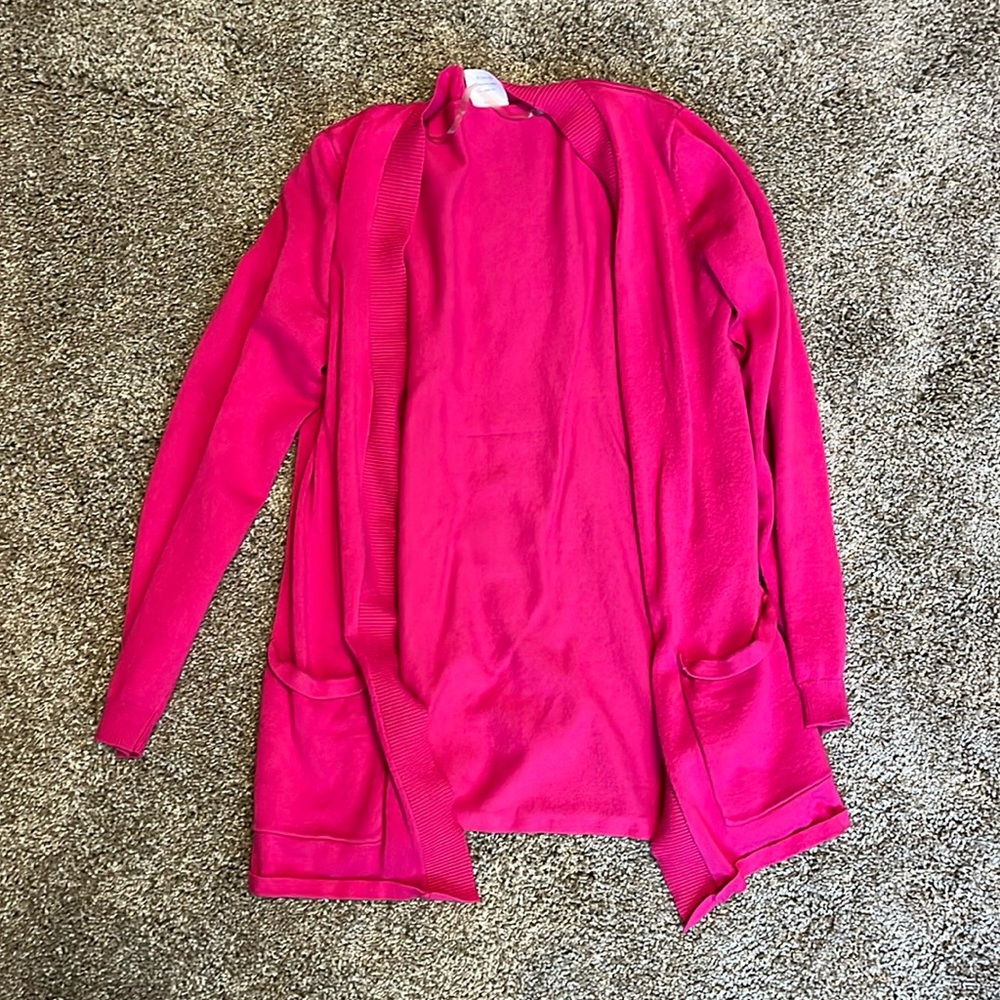 Pink Cardigan hardly worn. Could fit a women medium although it says kids 10-12